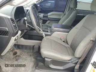 2018 Ford F-150 XL with VIN 1FTEW1E50JFC65370, listed as a Copart auction lot 59222655 with 213,487 mi miles and Salvage title. Bid and sale history available at DreamBid. Image 7.