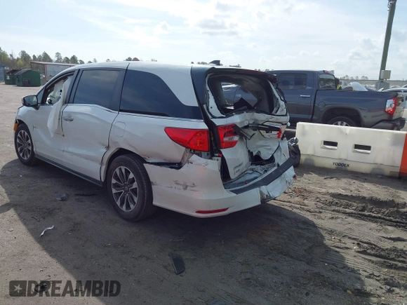 2022 Honda Odyssey EX-L with VIN 5FNRL6H7XNB027850, listed as a IAAI auction lot 41723046 with 84,299 mi miles and . Bid and sale history available at DreamBid. Image 3.