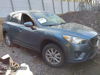 2016 Mazda CX-5 Touring with VIN JM3KE4CY5G0771252, listed as a IAAI auction lot 42138637 with 106,767 mi miles and . Bid and sale history available at carsss.com. Image 13.