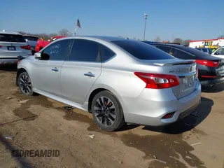 2018 Nissan Sentra S with VIN 3N1AB7AP1JY217456, listed as a IAAI auction lot 41647997 with 141,179 mi miles and . Bid and sale history available at DreamBid. Image 3.