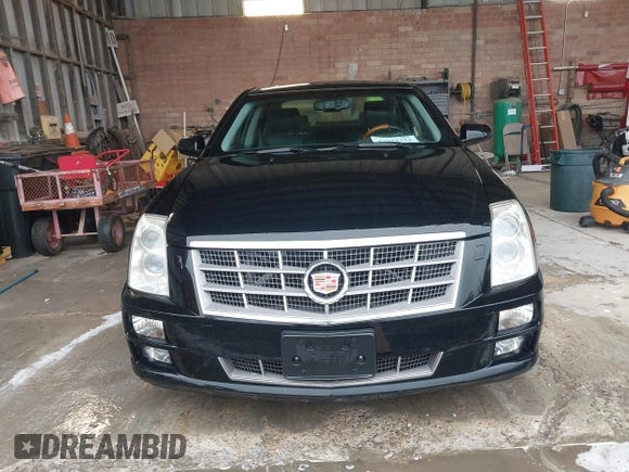 2011 Cadillac STS RWD w/1SB with VIN 1G6DW6ED1B0121186, listed as a IAAI auction lot 42094324 with 101,886 mi miles. Bid and sale history available at carsss.com. Image 12.