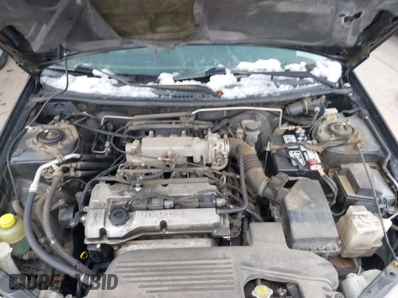 2000 Mazda Protege DX with VIN JM1BJ2227Y0303448, listed as a IAAI auction lot 41482747 with 206,542 mi miles and . Bid and sale history available at DreamBid. Image 10.