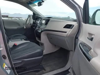2014 Toyota Sienna SE with VIN 5TDXK3DC4ES491269, listed as a IAAI auction lot 42004485 with 118,516 mi miles and . Bid and sale history available at DreamBid. Image 5.