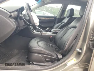 2011 Cadillac CTS with VIN 1G6DA5EYXB0137933, listed as a Copart auction lot 54679985 with 222,010 mi miles and Clean Title. Bid and sale history available at DreamBid. Image 7.