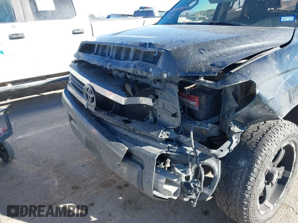 2014 Toyota Tundra 4WD Truck SR with VIN 5TFUM5F17EX051674, listed as a IAAI auction lot 41296906 with 140,782 mi miles. Bid and sale history available at carsss.com. Image 6.