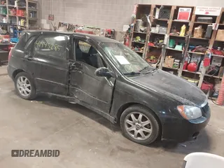 2005 Kia Spectra with VIN KNAFE161255083357, listed as a IAAI auction lot 41445285 with 90,349 mi miles. Bid and sale history available at carsss.com. Image 1.