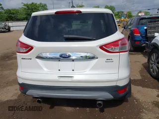 2013 Ford Escape SEL with VIN 1FMCU9HX6DUB14053, listed as a IAAI auction lot 42361297 with 144,861 mi miles and . Bid and sale history available at DreamBid. Image 16.