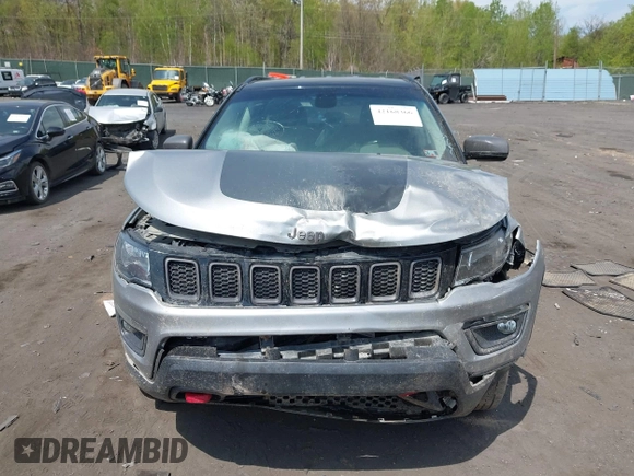 2020 Jeep Compass Trailhawk with VIN 3C4NJDDB4LT171685, listed as a IAAI auction lot 42168366 with 76,390 mi miles and . Bid and sale history available at DreamBid. Image 12.