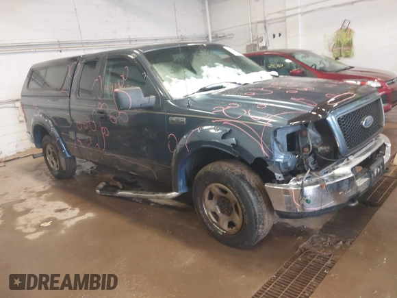 2005 Ford F-150 XLT with VIN 1FTPX14555NA01757, listed as a IAAI auction lot 41935980 with 145,311 mi miles. Bid and sale history available at carsss.com. Image 1.