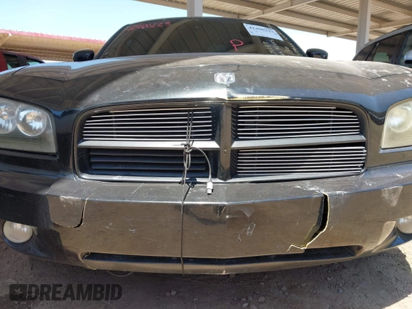 2007 Dodge Charger z VIN 2B3KA43R27H671197, wystawiony jako IAAI lot #42400223 z przebiegiem 180 948 mil mil oraz . Historia ofert i sprzedaży dostępna na DreamBid. Obrazek 6.