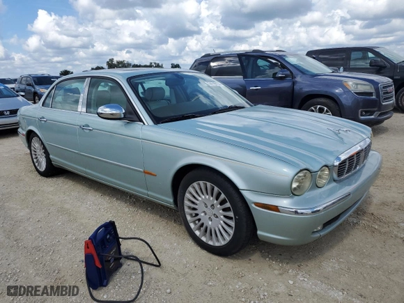 2005 Jaguar XJ VDP with VIN SAJWA82C35SG38532, listed as a Copart auction lot 74119114 with NaN miles and Salvage Title. Bid and sale history available at carsss.com. Image 4.