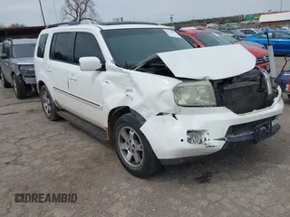 2009 Honda Pilot Touring with VIN 5FNYF48929B032510, listed as a IAAI auction lot 41945923 with 236,256 mi miles and . Bid and sale history available at carsss.com. Image 1.