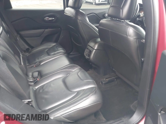 2015 Jeep Cherokee Limited with VIN 1C4PJLDB8FW732892, listed as a IAAI auction lot 41866593 with 153,477 mi miles and . Bid and sale history available at DreamBid. Image 8.