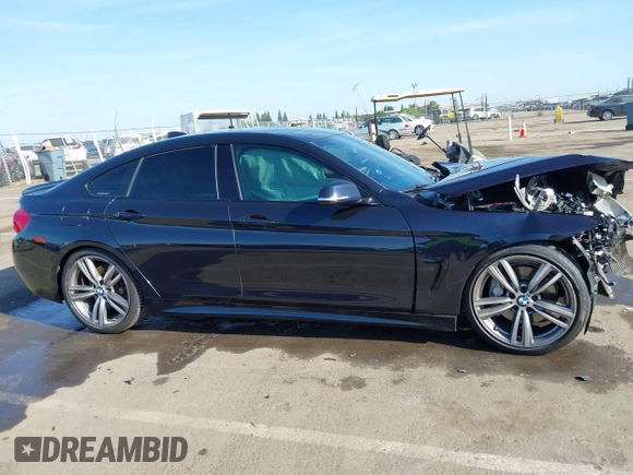 2015 BMW 4 Series 435i with VIN WBA4B1C54FD418309, listed as a IAAI auction lot 42099401 with 119,982 mi miles and . Bid and sale history available at carsss.com. Image 13.