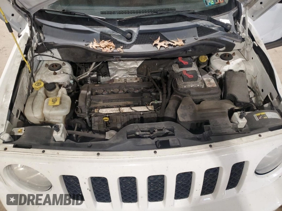 2014 Jeep Patriot Sport z VIN 1C4NJRBB5ED625497, wystawiony jako Copart lot #54192355 z przebiegiem 119 435 mil mil oraz Szkoda całkowita • Salvage title. Historia ofert i sprzedaży dostępna na DreamBid. Obrazek 11.