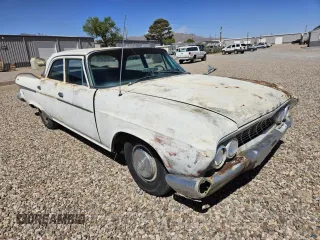 1961 Dodge Dart z VIN 5217186461, wystawiony jako Copart lot #54276085 z przebiegiem 59 702 mil mil oraz Czysty tytuł • Clean title. Historia ofert i sprzedaży dostępna na DreamBid. Obrazek 1.