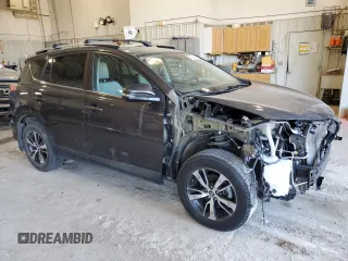 2016 Toyota RAV4 XLE with VIN 2T3RFREV5GW450084, listed as a Copart auction lot 48234635 with 123,008 mi miles and Salvage Title. Bid and sale history available at carsss.com. Image 4.