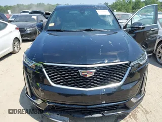 2021 Cadillac XT6 Premium Luxury with VIN 1GYKPDRS0MZ153523, listed as a IAAI auction lot 42770895 with 19,843 mi miles and . Bid and sale history available at DreamBid. Image 6.