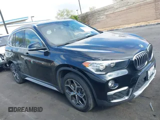 2019 BMW X1 sDrive28i with VIN WBXHU7C59K5L12320, listed as a IAAI auction lot 42116860 with 28,183 mi miles and . Bid and sale history available at DreamBid. Image 14.