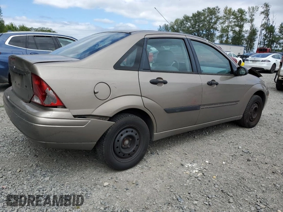 2004 Ford Focus LX with VIN 1FAFP33P24W148563, listed as a Copart auction lot 63869755 with 142,243 mi miles and Salvage title. Bid and sale history available at DreamBid. Image 3.