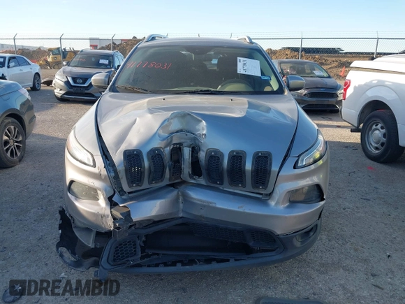 2015 Jeep Cherokee Latitude z VIN 1C4PJMCS3FW673872, wystawiony jako IAAI lot #41778031 z przebiegiem 173 845 mil mil oraz . Historia ofert i sprzedaży dostępna na DreamBid. Obrazek 12.