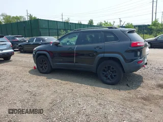 2014 Jeep Cherokee Trailhawk with VIN 1C4PJMBS8EW285276, listed as a IAAI auction lot 42408796 with Not provided miles and . Bid and sale history available at DreamBid. Image 13.