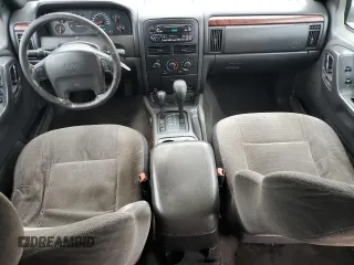 2000 Jeep Grand Cherokee Laredo z VIN 1J4GW48S8YC335926, wystawiony jako Copart lot #80693454 z przebiegiem 353 635 mil mil oraz Nie do naprawy • Non repairable. Historia ofert i sprzedaży dostępna na DreamBid. Obrazek 8.