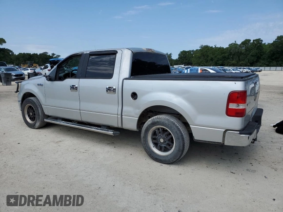 2006 Ford F-150 XLT with VIN 1FTRW12W06KD84579, listed as a Copart auction lot 55090155 with 296,917 mi miles and Salvage Title. Bid and sale history available at DreamBid. Image 2.