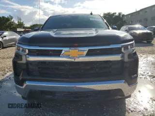 2024 Chevrolet Silverado 1500 LT with VIN 1GCPACEK7RZ172204, listed as a Copart auction lot 77741014 with 9,590 mi miles and Salvage Title. Bid and sale history available at DreamBid. Image 5.