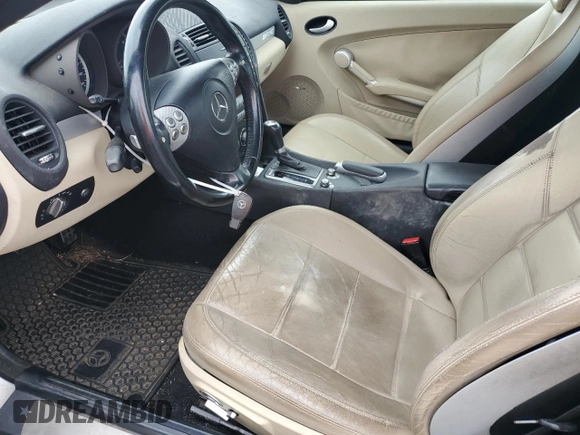 2006 Mercedes-Benz SLK-Class 5.5L AMG with VIN WDBWK73F86F101112, listed as a Copart auction lot 67330604 with 78,640 mi miles and Salvage Title. Bid and sale history available at carsss.com. Image 7.