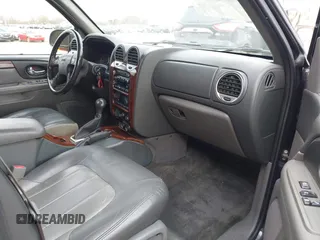2002 GMC Envoy SLT with VIN 1GKDT13S622506181, listed as a IAAI auction lot 41986061 with 212,583 mi miles. Bid and sale history available at carsss.com. Image 5.