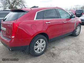 2014 Cadillac SRX Luxury Collection with VIN 3GYFNEE30ES584146, listed as a IAAI auction lot 41983346 with 71,880 mi miles. Bid and sale history available at carsss.com. Image 4.