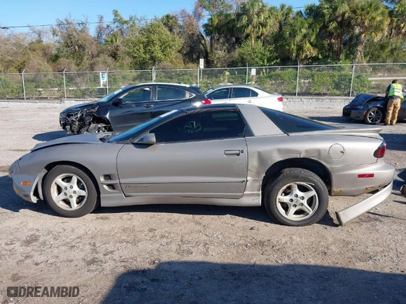 2000 Pontiac Firebird with VIN 2G2FS22K0Y2112410, listed as a IAAI auction lot 41676541 with 129,857 mi miles. Bid and sale history available at carsss.com. Image 14.
