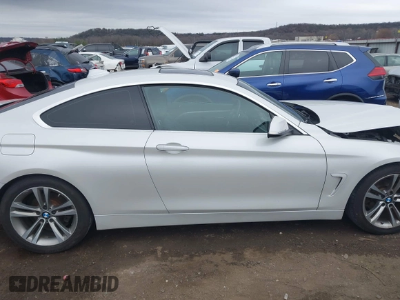 2016 BMW 4 Series 428i with VIN WBA3N7C54GK227475, listed as a IAAI auction lot 40963425 with 87,408 mi miles and . Bid and sale history available at carsss.com. Image 13.