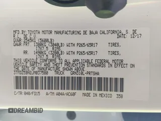 2018 Toyota Tacoma SR5 with VIN 3TMDZ5BN2JM037580, listed as a IAAI auction lot 42248418 with 35,661 mi miles and . Bid and sale history available at DreamBid. Image 9.