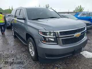 2019 Chevrolet Suburban LT z VIN 1GNSKHKCXKR405555, wystawiony jako IAAI lot #42188860 z przebiegiem 143 435 mil mil oraz . Historia ofert i sprzedaży dostępna na DreamBid. Obrazek 1.