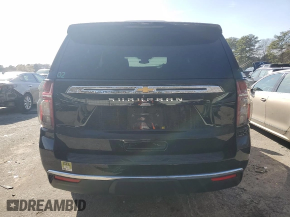 2023 Chevrolet Suburban LS with VIN 1GNSCBKD8PR163178, listed as a Copart auction lot 47844175 with 104,369 mi miles and Salvage Title. Bid and sale history available at DreamBid. Image 6.