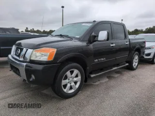 2010 Nissan Titan LE with VIN 1N6BA0EC8AN318538, listed as a Copart auction lot 74122194 with Not Provided miles and Salvage Title. Bid and sale history available at carsss.com. Image 1.