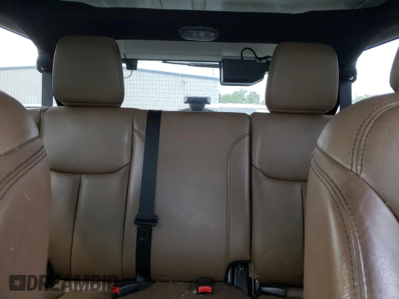 2013 Jeep Wrangler Unlimited Sahara with VIN 1C4HJWEG9DL628684, listed as a Copart auction lot 57672175 with 69,010 mi miles and Salvage title. Bid and sale history available at DreamBid. Image 10.