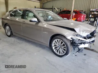 2016 BMW 5 Series 528i with VIN WBA5A5C54GD529359, listed as a Copart auction lot 61907235 with 111,621 mi miles and Salvage title. Bid and sale history available at DreamBid. Image 4.