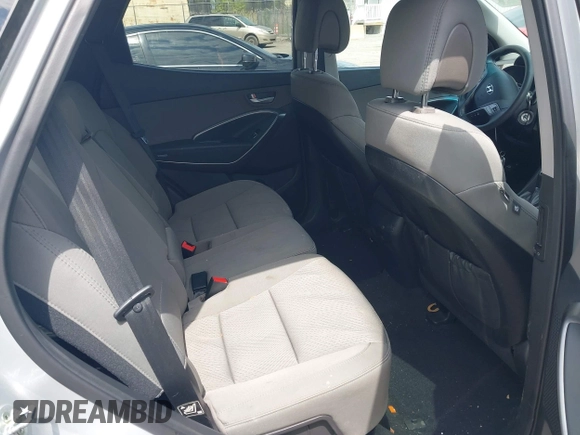 2017 Hyundai Santa Fe 2.4L z VIN 5XYZUDLB6HG400828, wystawiony jako IAAI lot #42013903 z przebiegiem 88 573 mil mil oraz . Historia ofert i sprzedaży dostępna na DreamBid. Obrazek 8.