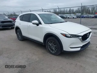 2017 Mazda CX-5 Touring z VIN JM3KFACL3H0215619, wystawiony jako IAAI lot #41925073 z przebiegiem 186 691 mil mil oraz . Historia ofert i sprzedaży dostępna na DreamBid. Obrazek 1.