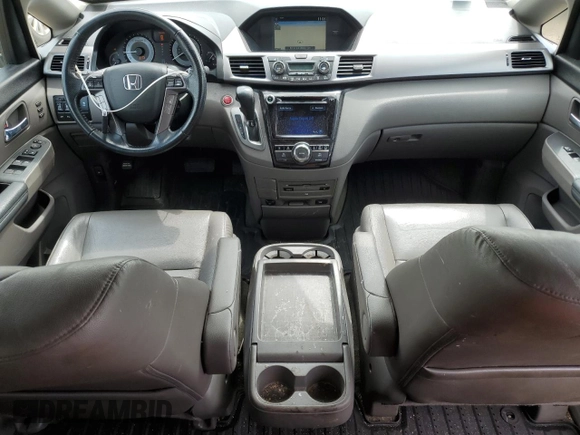 2015 Honda Odyssey Touring Elite z VIN 5FNRL5H96FB047204, wystawiony jako Copart lot #56297985 z przebiegiem 125 482 mil mil oraz Szkoda całkowita • Salvage title. Historia ofert i sprzedaży dostępna na DreamBid. Obrazek 8.