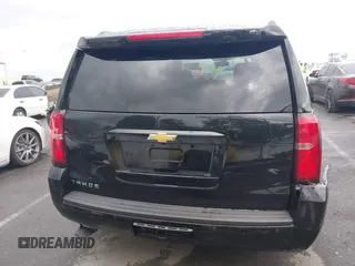 2016 Chevrolet Tahoe LS z VIN 1GNSCAEC8GR387676, wystawiony jako IAAI lot #41774142 z przebiegiem 36 695 mil mil oraz . Historia ofert i sprzedaży dostępna na DreamBid. Obrazek 17.