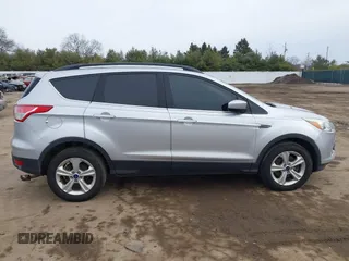 2016 Ford Escape SE with VIN 1FMCU9G94GUC06902, listed as a IAAI auction lot 41432640 with 200,575 mi miles. Bid and sale history available at carsss.com. Image 14.