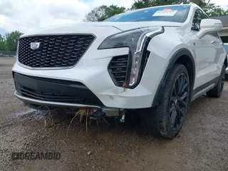 2022 Cadillac XT4 AWD Premium Luxury z VIN 1GYFZDR42NF128199, wystawiony jako IAAI lot #42522314 z przebiegiem 29 002 mil mil oraz . Historia ofert i sprzedaży dostępna na DreamBid. Obrazek 6.
