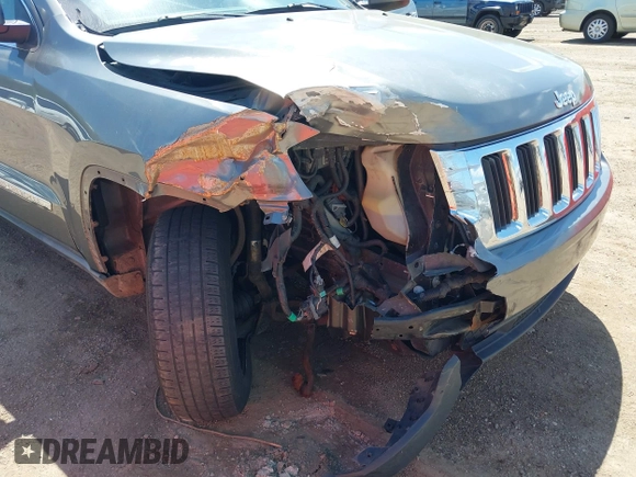 2011 Jeep Grand Cherokee Laredo with VIN 1J4RR4GGXBC587911, listed as a IAAI auction lot 42156885 with 178,999 mi miles and . Bid and sale history available at DreamBid. Image 6.