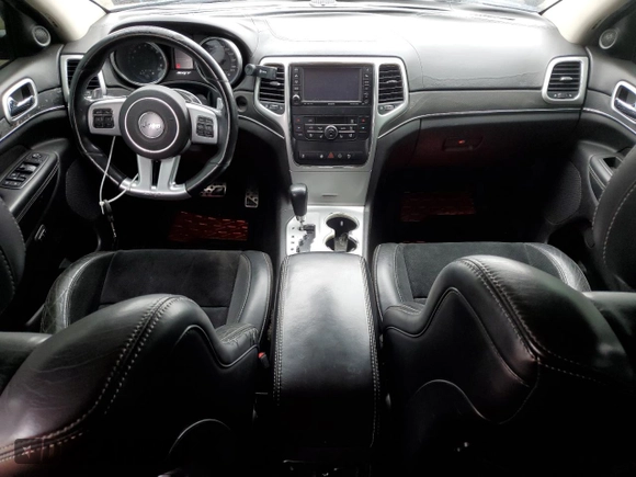 2012 Jeep Grand Cherokee SRT8 with VIN 1C4RJFDJ4CC350907, listed as a Copart auction lot 49409205 with 171,352 mi miles and Clean Title. Bid and sale history available at carsss.com. Image 8.
