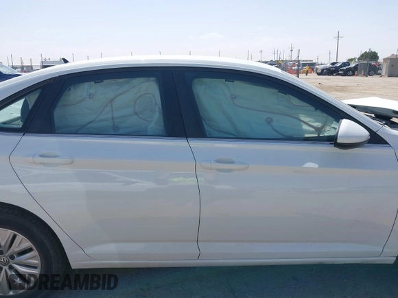 2019 Volkswagen Jetta S z VIN 3VWC57BU7KM110001, wystawiony jako IAAI lot #42244184 z przebiegiem 49 883 mil mil oraz . Historia ofert i sprzedaży dostępna na DreamBid. Obrazek 14.