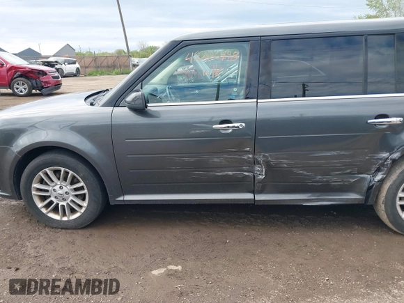 2016 Ford Flex SEL z VIN 2FMGK5C82GBA21945, wystawiony jako IAAI lot #42206498 z przebiegiem 141 320 mil mil oraz . Historia ofert i sprzedaży dostępna na DreamBid. Obrazek 14.